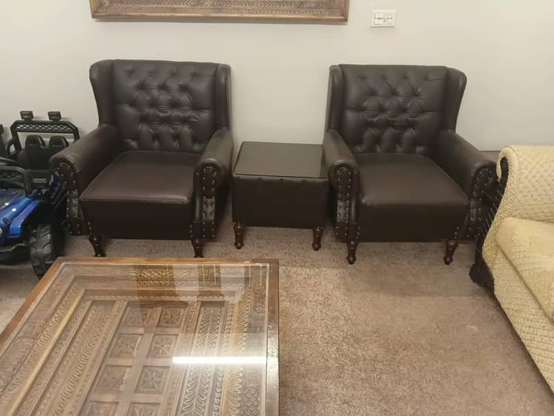 2 Single seater sofa with Table 4