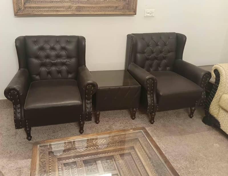2 Single seater sofa with Table 7