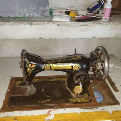 Swing machine with tabel condition 10/8 urgent sale cntact 03047716044