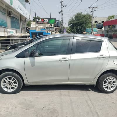 Toyota Vitz model 2011 registered in 2014 in mint condition going to .