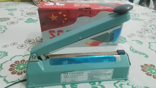 Brand New Heavy Duty Plastic Film Sealer Machine available for sale!