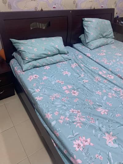 Two Single Beds With Mattresses And Single Side Table