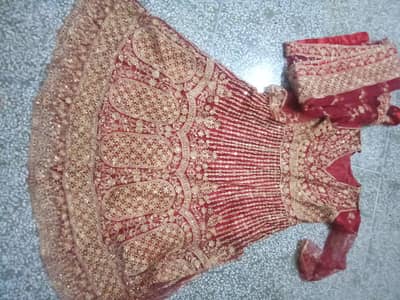 Red and golden heavy Embroidered maxi  , used once