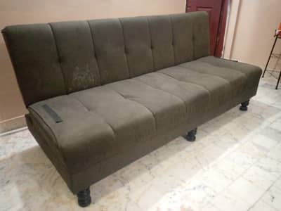 Cumbed sofa with bed and relaxer