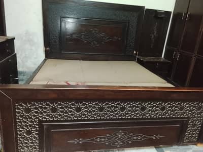 Double bed with site table