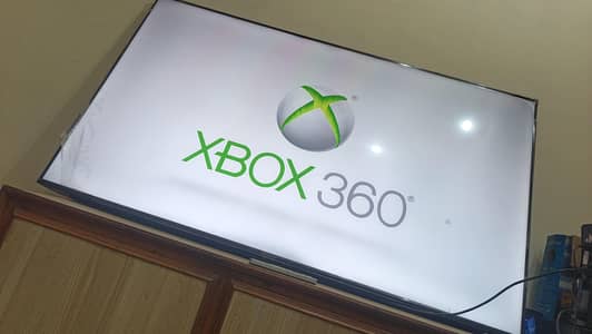 Xbox 360 with 65" led Haier