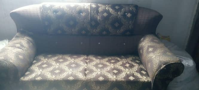 Pair of 2 seater sofa 1 table
