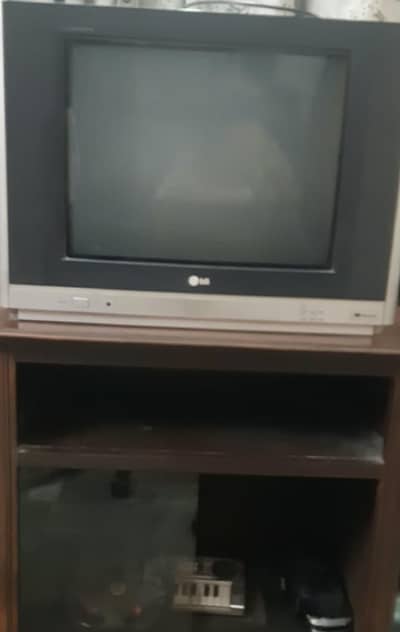 T. V WITH TROLLEY