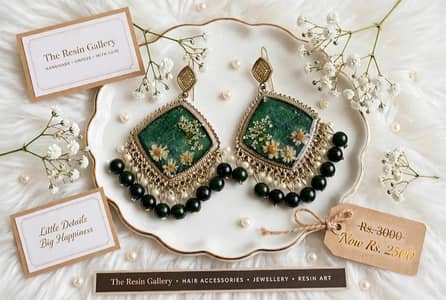 handmade green flora resinl jhumka earrings. The Resin Gallery Rs2500