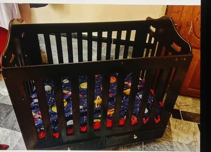 Wooden baby cot with a soft mattress - good conditions