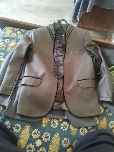 Pent coats for kids. Almost new. one time used only. 10to 12 years. 24n26