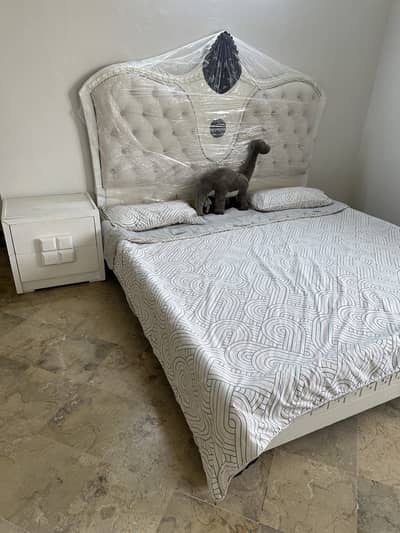 Elegant Upholstered Bed with Matching Side Table for Sale