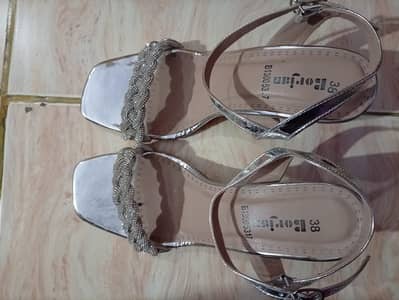 Golden and silver sandals
