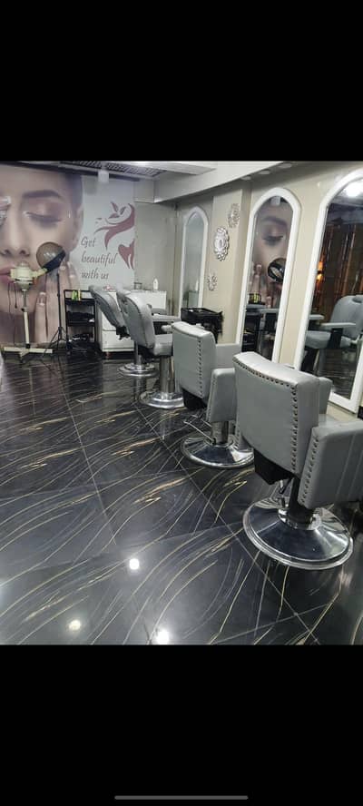 selling my running business male n female saloon contact 0331455559