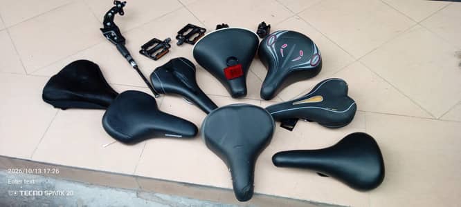 Seats and stand and pedals and mudguards and light