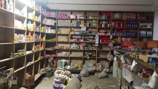 general store shelves and racks or 2 chillers or 2 showcase counters