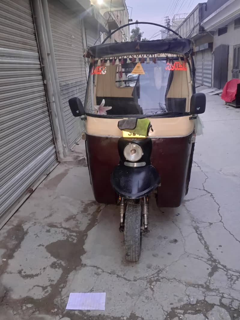 سازگار لوڈر رکشہ 0