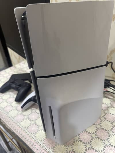 Ps5 slim disc  + 1x extra controller