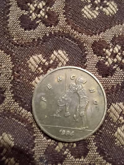 Vintage 1984 Commemorative Sports Coin – Collectible