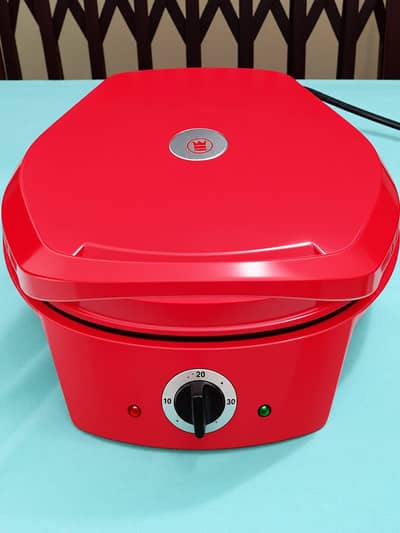 Pizza maker . . .