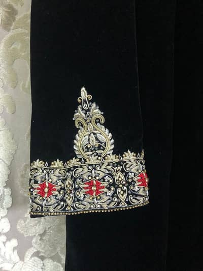Black velvet groom sherwani with turban and khussa