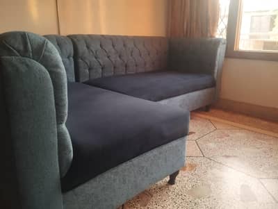 L shaped chesterfield style sofa