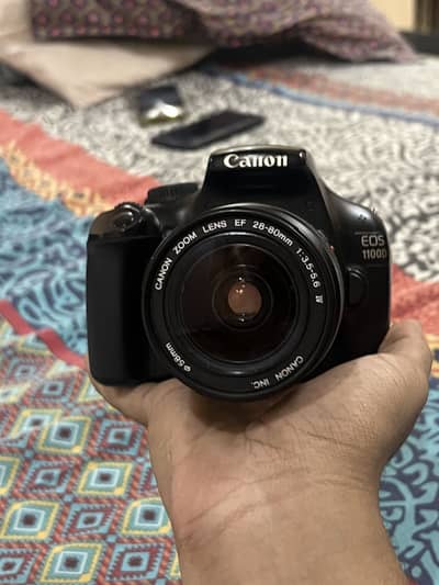 Canon EOS 1100D DSLR Camera with 18-55mm Lens
