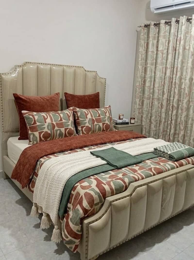 bed with 2 side tables and dressing table 1