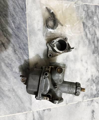honda 125 2010 model carburetor