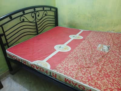 king size rod iron bed with mattress very good condition