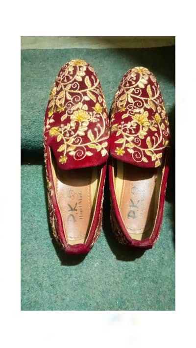 made with golden tila embroidery shoes for function