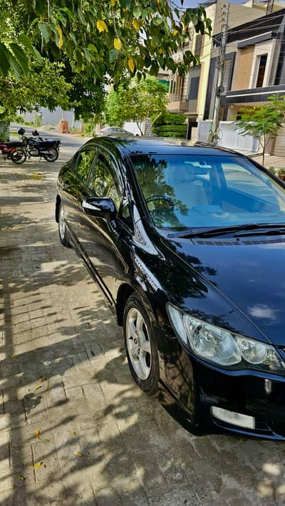 Honda Civic Reborn 2010 Full Option – Black, Automatic, Sunroof.