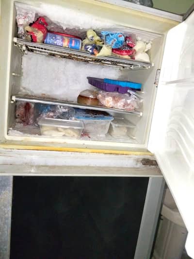Dawlance 13 cft refrigerator good working properly