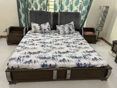Double bed with couch side table dressing table lamp