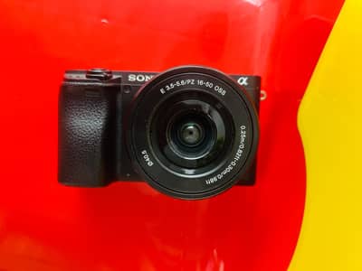 Sony a6400 with 16-50mm lens (9/10 ) condition