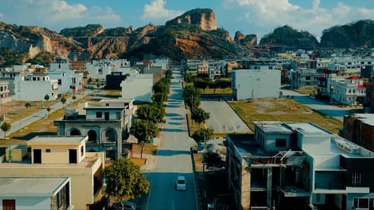 5 Marla Plot ( 25*50 in Block C , Plot No: 5137 ). MDR Plot ( Plot on Main Double Road ) + NDC Open. For Sale Faisal Hills C Block Islamabad.