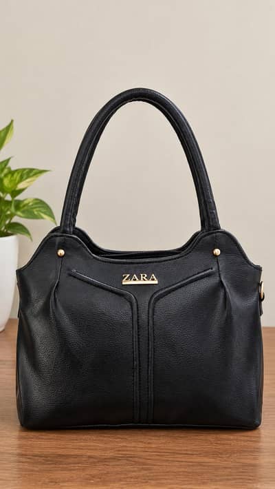 Elegant Black ZARA Handbag with Gold Detailing