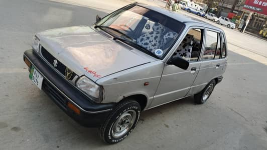 Suzuki Mehran VX 2002 total genion gari hai contact no 03340069302