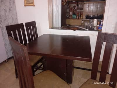 wooden dining table with 4 chairs