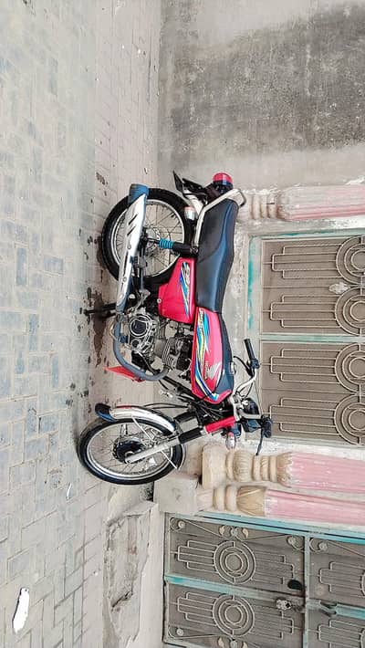 Honda cg 125 total genuine engine ka Kam krwaya hy 16 model 10/9 cond