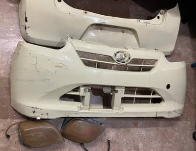 Mira car front and back bumpers back lites for sale good condition