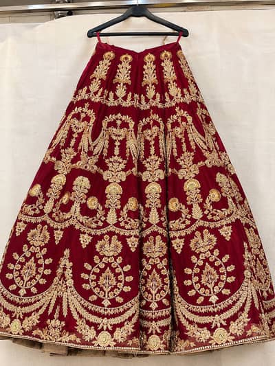 Beautiful Maroon Bridal Lehenga with Heavy Golden work