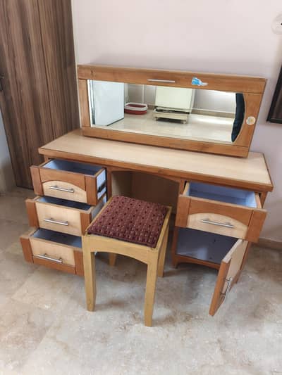 dressing table and wooden chair