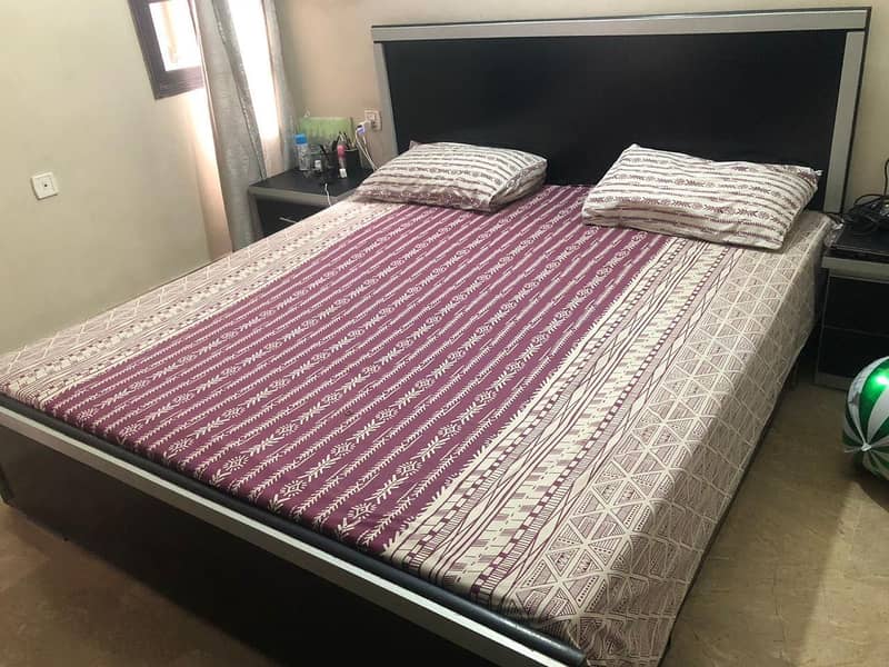 Bed with side table 0