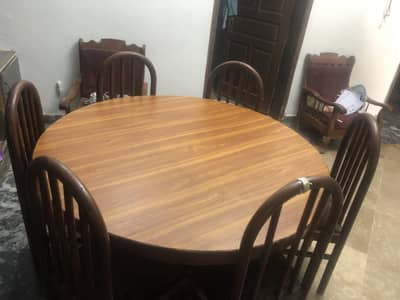 Wooden round dining table with 6 chairs