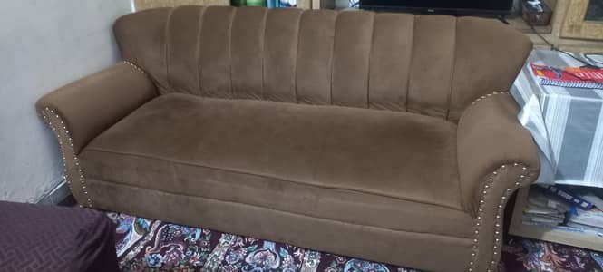 one 3 seater and two single seater sofas