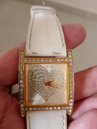 GUESS Square is Designing Watch with Diamond Style.