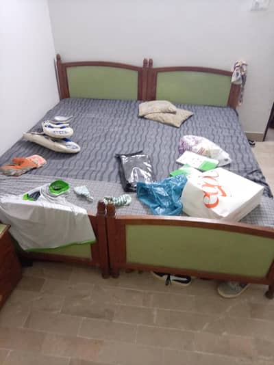 2 single beds with mattress