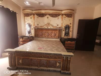 fancy bed and dressing drawers