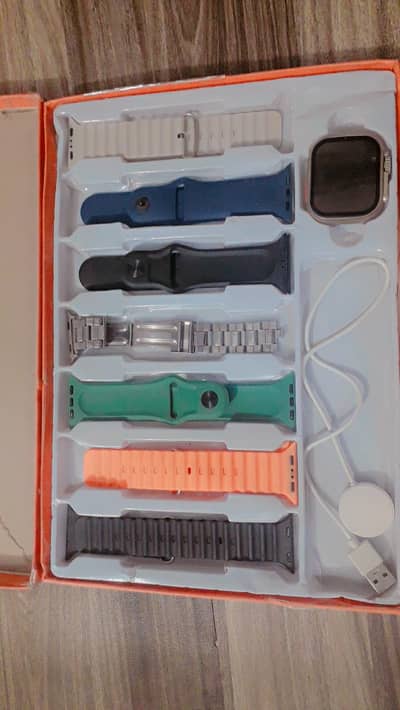 ​Smart Watch Ultra with Multiple Straps & Charger (Battery Issue)